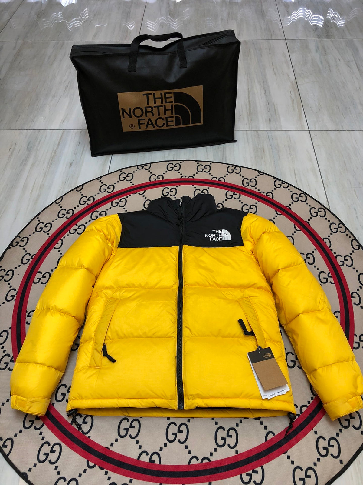The North Face Yellow and Black Colorblock Puffer Jacket